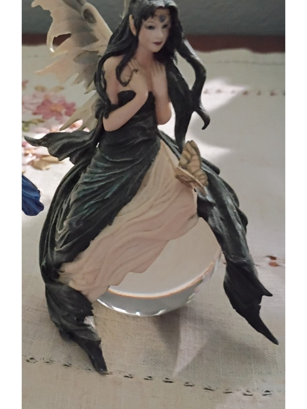 Nene Thomas Fairy Sitting On Globe